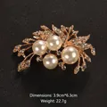 Elegant gold floral brooch with white pearls and rhinestones for coats and sweaters. - Hollow Leaf Petal Style (XD1323) / Size: 3.9x6.3cm / Gold