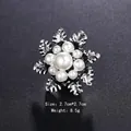 Vintage silver flower brooch pin with central pearl and ornate leaf details for elegance - Vintage Floral Style (XD7478-1)