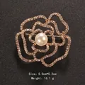 Elegant gold rose brooch with sparkling rhinestones and center pearl for dresses - Camellia Shape Style (6415) / Size: 5.0x5.2cm / Gold