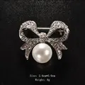 Exquisite silver bow brooch with a large central pearl and sparkling rhinestones - Small Pave Rhinestone Bowknot Large Pearl (XD6408-2) / 2.6x3.0cm / Small Bowknot Center Pearl (Silver)
