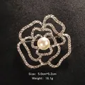 Elegant silver camellia rose brooch with sparkling rhinestones and center pearl accent - Camellia Shape Style (6415) / Size: 5.0x5.2cm / Silver