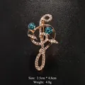 Elegant gold-tone musical note brooch with blue crystals and sparkling white rhinestones - Music Note Style (XD9425-2) / Gold/Blue