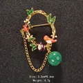 Vintage enamel wreath brooch featuring a bird, ladybug, gold chain and a green bead - 3.2cm*5.6cm / Gold Garden Bird Garland