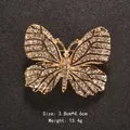 Elegant gold-tone alloy butterfly brooch with sparkling rhinestones, 3.8 x 4.6 cm - Gold-White Rhinestone Butterfly Style (XD7339-6)