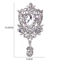 Ornate vintage crystal waterdrop brooch showing dimensions 10.05cm height detail view - Silver Hollow Spherical Pendant Style (XD7407)