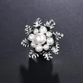 Elegant vintage silver camellia flower brooch pin with pearls on black background - Ancient Silver Base with Off-White Pearl