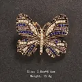 Colorful rhinestone butterfly brooch in gold-tone alloy for elegant garment decoration - Multi-Color Rhinestone Butterfly Style (XD7339-10)