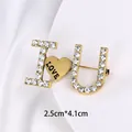 Golden vintage heart brooch pin featuring 'I Love U' with sparkling clear rhinestones - I Love U Valentine Rhinestone Style (XD10532-1)