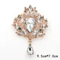 Ornate rose gold crystal brooch featuring a dangling teardrop stone, 9.5x7.0 cm. - Rose Gold White Water Drop Rhinestone Style (XD145-3)
