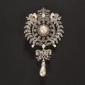 Elegant vintage silver-tone crystal brooch featuring a white teardrop pearl pendant for coats. - Silver Base White Pearl Style (XD7208-2)