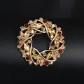 Elegant gold crystal flower wreath brooch for women featuring amber stones in Korean style - KC Gold Coffee