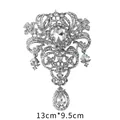 Large silver-toned vintage style crystal brooch featuring elegant teardrop pendants - Silver Symmetrical Hollow Style (XD7720-1)