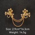 Gold chain brooch pin with spider design, pearls, and rhinestones. - 2.9cm*16.3cm / Skull