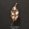 Elegant cat-eye stone leaf brooch with crystal accents, size 2.3x6.2cm, gold finish, 8.7g weight - Leaf Shape (XD9158)