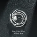 Elegant silver-tone spiral brooch with rhinestones and a central faux pearl - Spiral Vortex Shape (XD9124) / Silver