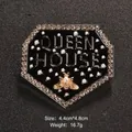 Elegant hexagonal bee brooch with pearls and "QUEEN HOUSE" text in gold finish. - Black Hexagon Bee (XD10503)