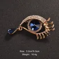 Elegant eye-shaped brooch with blue gemstone and gold eyelashes, size 3.2cm x 6.3cm - 3.2cm*6.3cm / Gold Eye with Eyelash