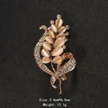 Elegant golden wheat-shaped brooch with soft cat's eye stones and sparkling crystals - Wheat Ear Shape (XD9166)