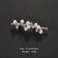 Elegant silver-tone branch brooch featuring white pearls and sparkling rhinestones - Silver Branch Style (XD7691-3)