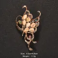Elegant gold butterfly brooch with champagne cat-eye stones and colorful rhinestones - Butterfly Shape (XD9172)