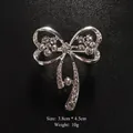 Sparkly silver-tone bow brooch with clear rhinestones, 3.8cm x 4.5cm variant display - Floral Style Pave Bowknot (XD9142-2) / 3.8x4.5cm / Floral Pave Bowknot (Silver)