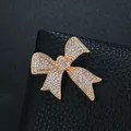 Elegant gold-tone bow brooch encrusted with shimmering clear rhinestones on black leather - Elegant Pave Bowknot (XD10852) / Elegant Pave Bowknot (Gold)