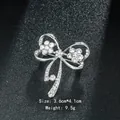 Elegant silver bow brooch with sparkling crystal rhinestones for formal suits and dress - Bowknot Shape (XD9142) / Silver