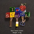 Colorful I Love School enamel brooch with rhinestones and cute school-themed charms. - Campus Theme Style (XD8544)