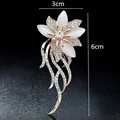Elegant rose gold flower brooch with white petals and crystals for suit accessories - Dangling Metal Floral Style (XD457)