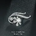 Elegant silver floral brooch pin featuring a large white pearl and sparkling crystals - Streamlined Floral Pearl Style (XD9127) / Silver