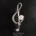 Elegant silver G-clef musical note brooch with rhinestones and pearl for suits - Silver/Single Pearl
