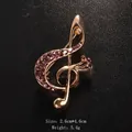Fashionable gold musical note brooch with purple rhinestones for men and women - Rose Gold / Purple Zirconia