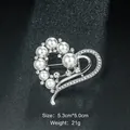 Elegant silver heart-shaped brooch decorated with white pearls and sparkling rhinestones - Heart Shape Pearl Style (XD7615) / Silver