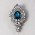 Vintage silver brooch with large oval blue crystal and clear rhinestones detail - British Symmetrical Oval Style (XD9080-2 Silver)