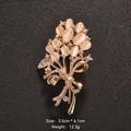High-quality elegant gold floral bouquet brooch with opal cat eye stones and shiny crystals - Bowknot Bouquet (XD453)