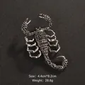 Detailed antique silver scorpion brooch with black crystals and green eyes, 4.4x8.2cm - Scorpion Style (XD8941)