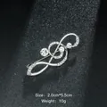 Elegant silver treble clef brooch pin featuring sparkling clear crystals for suit lapels - Musical Note Style (XD9114) / Silver