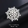 Elegant silver-toned snowflake brooch pin featuring white pearls and sparkling rhinestones - Snowflake Shape Pearl Style (XD9122) / Silver