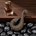 Luxury swan brooch with full champagne rhinestones on black river stones background - Grey Swan / Gunmetal
