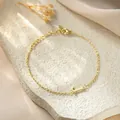 Elegant gold stainless steel jewelry bracelet featuring a delicate letter L initial charm - Letter J Style / Gold
