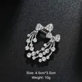 Elegant sparkling silver bow rhinestone brooch pin for dresses and suits, size 4.5x3.5cm. - Bowknot Radiant Style (XD8220) / Silver