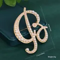 Elegant vintage gold-finish alphabet letter brooch embellished with small pearls - Letter B