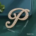 Elegant gold-tone letter P brooch with inlaid pearls for vintage styling - Letter P