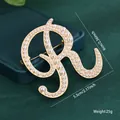 Vintage gold-tone letter R brooch pin with white pearls decoration and size details - Letter R