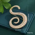 Elegant vintage gold finish pearl letter S brooch pin for stylish clothing accessories. - Letter S