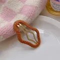 Cozy orange yarn-wrapped hollow wavy snap hair clip for autumn and winter styles - Cloud Style (F1224) / Coffee