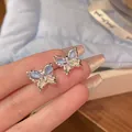 Elegant silver butterfly stud earrings featuring delicate blue and white stones - Butterfly Style (A1659 Blue) / Blue