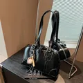 Stylish black large capacity underarm tote bag with baseball charm detail. - Black With Pendant