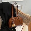 Stylish retro brown large capacity underarm shoulder bag in glossy faux leather finish - Brown With Pendant