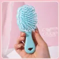 Compact light blue cloud-shaped air cushion hairbrush with a comfortable grip for girls - Cloud Airbag Comb / PVC Box / Blue